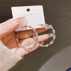 Gold and Silver Twist Hoop Earrings